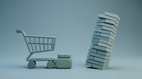 Conceptual illustration of a shopping cart icon connected to a few built-in blocks instead of a tall stack of separate app tiles, evoking fewer ecommerce app fees